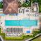 Super Lux 4BR Townhouse - 1 Mile from Disney World- Resort Pool & Jacuzzi , Gym, with Enchanted Garden - أورلاندو