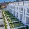 Beach Townhouses #106 - Conforto por Carpediem