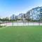 Luxurious 1BR Apt with Balcony in Production City - Dubaj