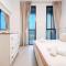 Luxurious 1BR Apt with Balcony in Production City - Dubaj