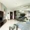 Homey 2BR Apartment Crown Court Executive Condominium By Travelio - Cikarang