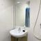 Homey and Minimalist Studio Gateway Park LRT City Jatibening Apartment By Travelio