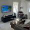Kick back and relax in this calm, stylish space