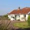 Larks Rise - Large Farm House Bungalow with Gardens & Field