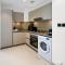 EaseMyTrip - Cozy and Elegant 1BR Apt with Large Pool and View