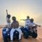 Enjoy Moda Camp Merzouga tours- Camel sunset sunrise Quad Sunboarding ATV