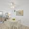 Sun-bright beachfront condo with pool/tennis courts