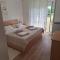 Apartments and rooms with parking space Palit, Rab - 22221 - Rab