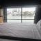 The Pier Pods on the water- 50m from Townsville bus terminal and ferry terminal- Passport ID requried