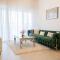 Elegant 1BR Retreat with Rooftop Pool in JVC - Dubaj