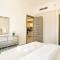 Elegant 1BR Retreat with Rooftop Pool in JVC - Dubaj