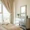 Elegant 1BR Retreat with Rooftop Pool in JVC - Dubaj