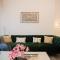 Elegant 1BR Retreat with Rooftop Pool in JVC - Dubaj
