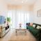 Elegant 1BR Retreat with Rooftop Pool in JVC - Dubaj