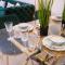 Elegant 1BR Retreat with Rooftop Pool in JVC - Dubaj