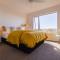 Modern and spacious with river and vineyard views - Kereru