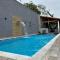 Casa Mar Itanhaem temporada Piscina - 伊塔尼亚恩