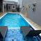 Casa Mar Itanhaem temporada Piscina - 伊塔尼亚恩
