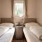 Forest Finest, luxe chalet met HOT TUB mooie overkapping en prachtige tuin met veel privacy - Гундерло