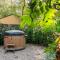 Forest Finest, luxe chalet met HOT TUB mooie overkapping en prachtige tuin met veel privacy - Гундерло