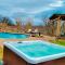 Elite 4BR 2BA Holiday Home with Hot Tub, Pool, and BBQ