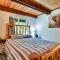 Rustic Cougar Cabin with Wood-Burning Fire Pit!