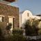 Sea Breeze Santorini Beach Resort, Curio By Hilton - 佩里沃罗