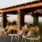 Sea Breeze Santorini Beach Resort, Curio By Hilton - 佩里沃罗
