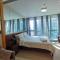 Caleze Properties One Uptown Residence BGC - Manila