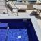 Sea Breeze Santorini Beach Resort, Curio By Hilton - 佩里沃罗