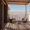 Sea Breeze Santorini Beach Resort, Curio By Hilton - 佩里沃罗