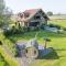 Cozy 4-Bedroom Chalet with Outdoor Spa in Zottegem