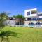 New modern luxury villa near the beach with sea view, pool, sauna , BBQ and playground by WiiBuk