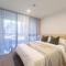 Oaks Canopy - Boutique 1 BR Apartments