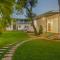 Sundream Palms by VEO - Part of StayVista with Pool, Lawn, BBQ - Alibag