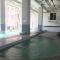 Homey Studio Room at Harvard Jatinangor Apartment By Travelio