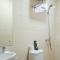 Comfortable and Tidy 2BR at Vida View Apartment By Travelio