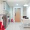 Comfortable and Tidy 2BR at Vida View Apartment By Travelio