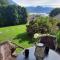 Gallery - Terrasse mit Seeblick und Garten