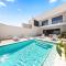 Boca Catalina 5 NEW 4BR 4BA Pool Walk to Beach by Bocobay