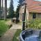 Bosboerderij de Goudsberg met hottub in tuin - 卢特伦