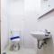 Homey and Elegant Studio Amazana Serpong Apartment By Travelio - 当格浪
