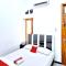 RedDoorz at Queen Asri Premium - 谏义里