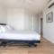 Stylish Central City Retreat with Pool Parking