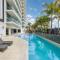 Sunny Coastal Retreat with Poolside Escape