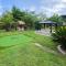 Cozy Coral Cottage with Tiki Hut, Mini Golf, Arcade and Grill - Cape Coral