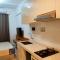Skyhouse BSD 2 Bedroom & Studio Apartments - Perfect for ICE BSD Events - Tjilenggang