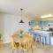 Spacious Garden City Townhome with Lake Views!