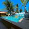 Recantos Pinheiros - Casa inteira, até 15 hóspedes - Piscina privativa, sinuca, ar condicionado e TVs nos 4 quartos - Condomínio Orla 500, lado praia - Unamar, Cabo Frio-RJ