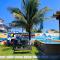 Recantos Pinheiros - Casa inteira, até 15 hóspedes - Piscina privativa, sinuca, ar condicionado e TVs nos 4 quartos - Condomínio Orla 500, lado praia - Unamar, Cabo Frio-RJ